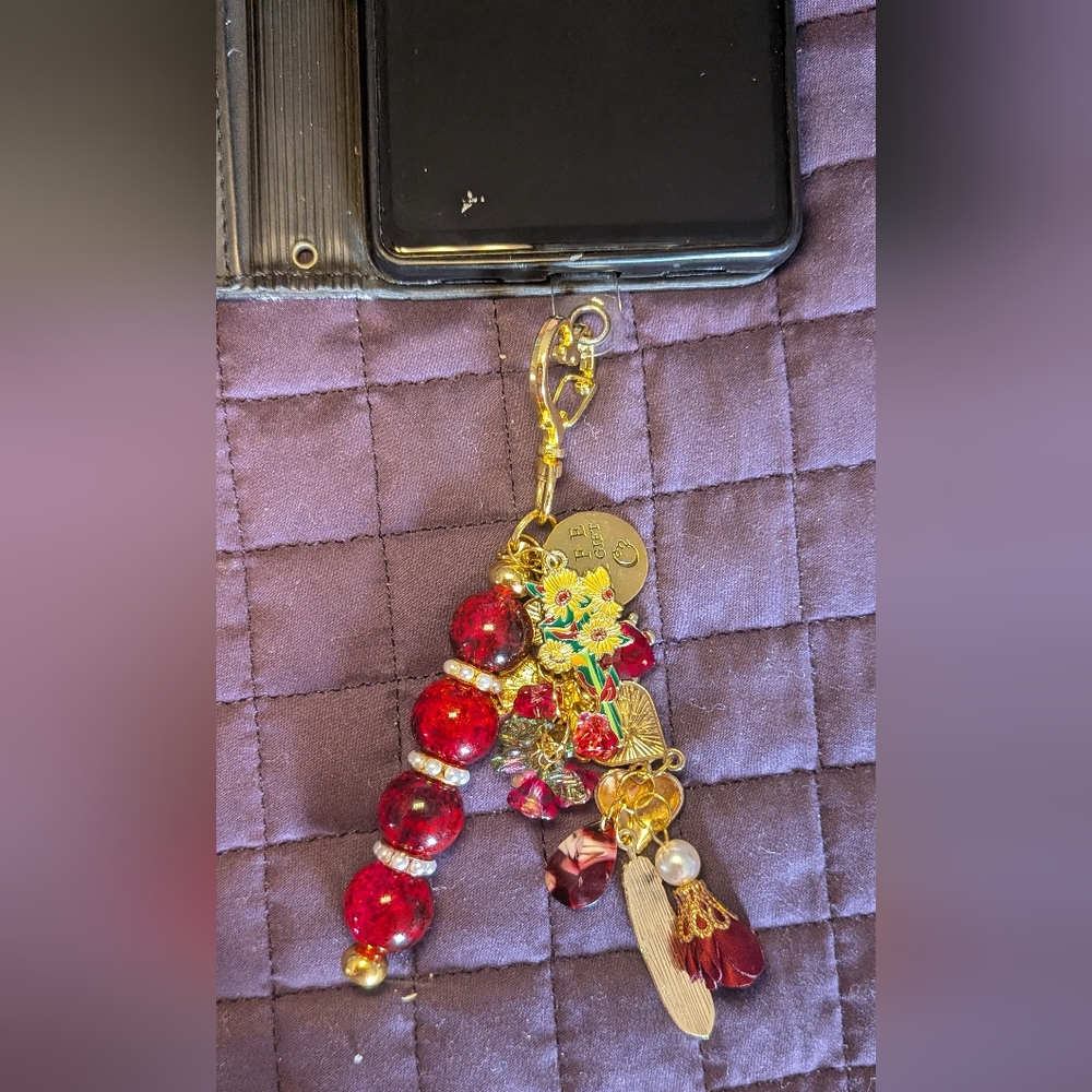 Elegant Red and Gold Phone Charm